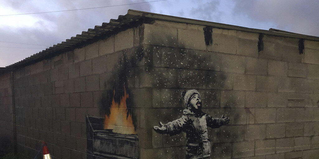 Das Banksy-Werk in Port Talbot, Wales, wurde für einen sechsstelligen Betrag verkauft. Der Käufer will es vorerst am Entstehungsort lassen und damit den Tourismus ankurbeln. Das Banksy-Werk in Port Talbot, Wales, wurde für einen sechsstelligen Betrag verkauft. Der Käufer will es vorerst am Entstehungsort lassen und damit den Tourismus ankurbeln.