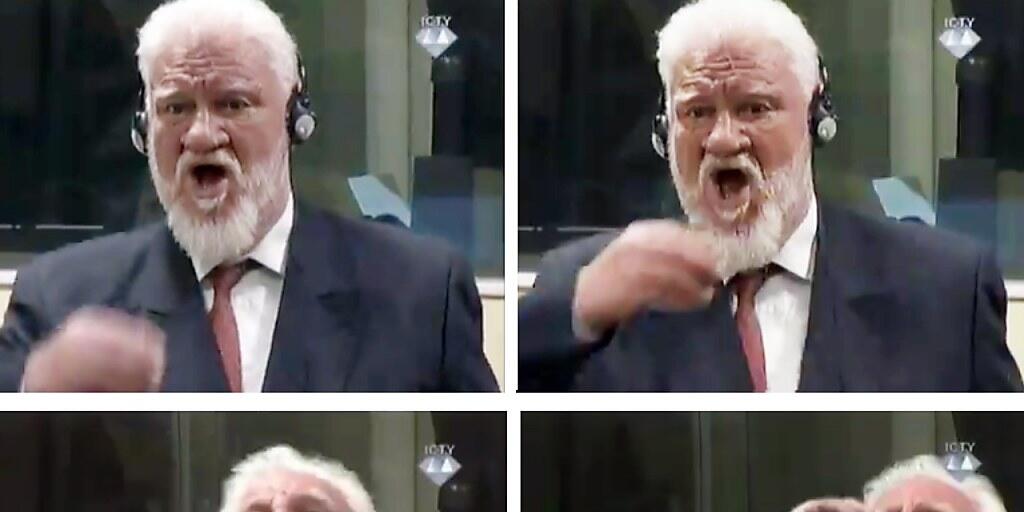 Überwachungsbilder aus dem Gerichtssaal zeigen, wie der bosnisch-kroatische Ex-Militärkommandat Slobodan Praljak das Gift Zyankali zu sich nimmt.