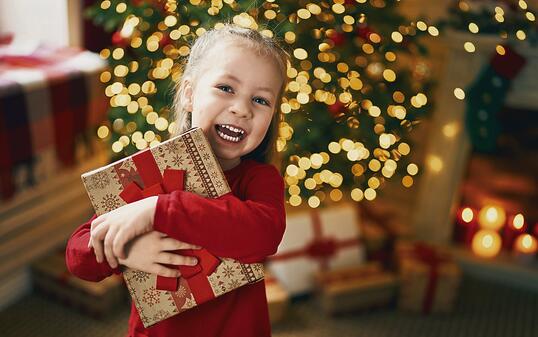 girl with Christmas gift.