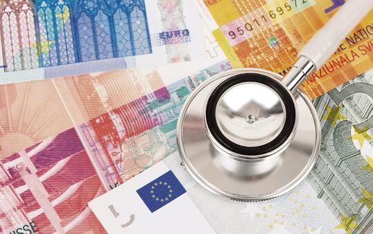 Stethoscope on Europe banknote concept financial health check