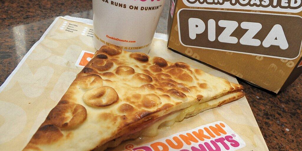 Die US-Fastfood-Kette Dunkin' Donuts kommt in neue Hände. (Archivbild) Die US-Fastfood-Kette Dunkin' Donuts kommt in neue Hände. (Archivbild)