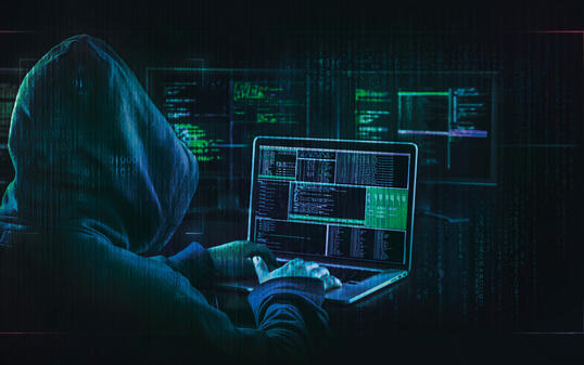 dark web hooded hacker