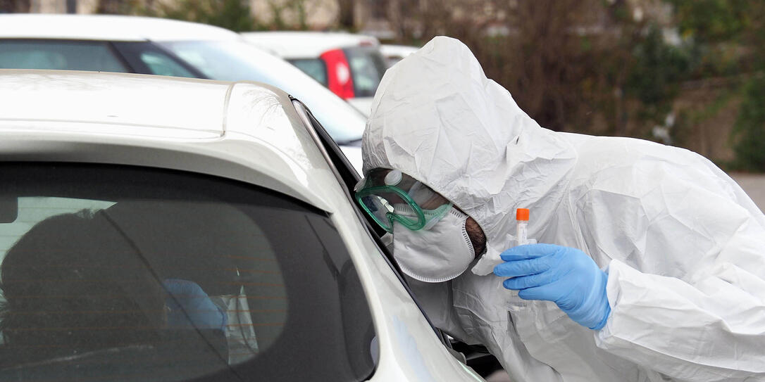Italy, coronavirus test drive-through, directly in the car