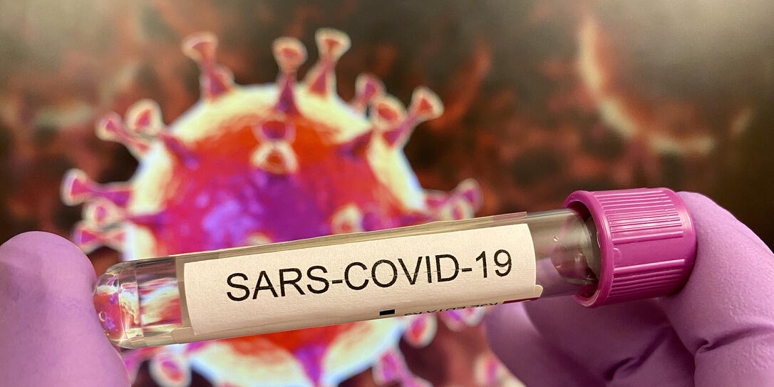 Sars-CoV-19 test tube, virus illustration on screen Sars-CoV-19 test tube, virus illustration on screen