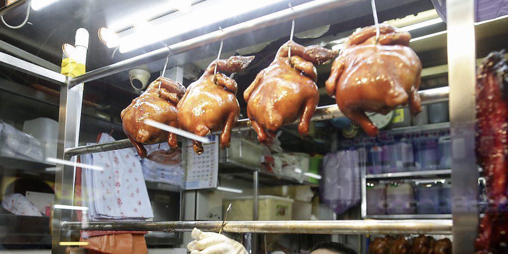 Chan Hong Meng besitzt mit seinem Essenstand das billigste Michelin-Stern-Lokal der Welt. Nun eröffnet er ein richtiges Restaurant. (Archiv)