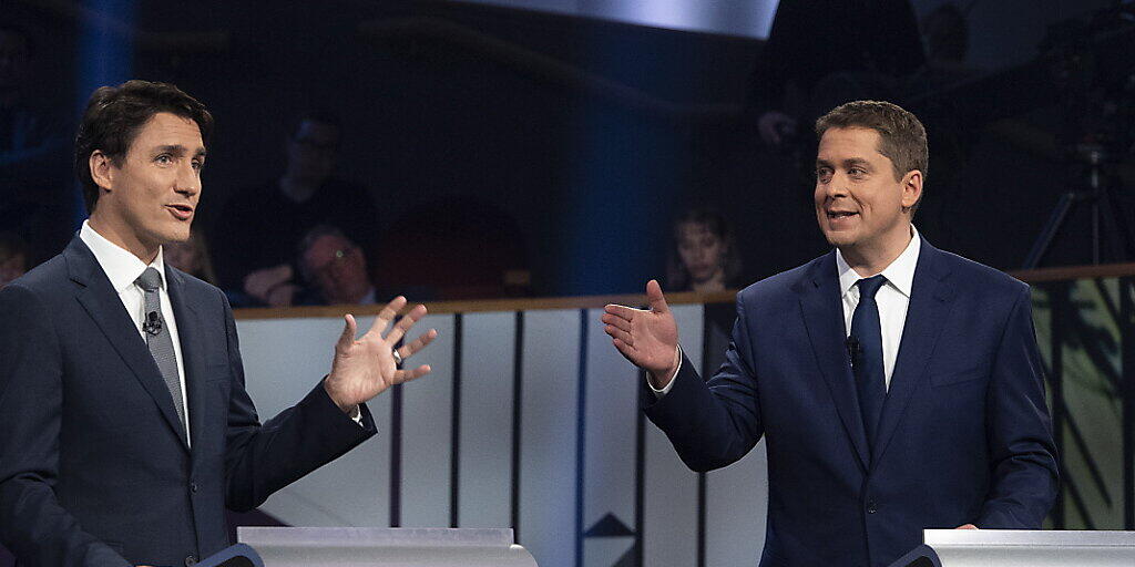 Rund 27 Millionen B&uuml;rger waren in Kanada dazu aufgerufen, ein neues Parlament zu w&auml;hlen. Es zeichnet sich ein knappes Rennen zwischen den Liberalen von Premierminister Trudeau (l) und dessen konservativem Herausforderer Andrew Scheer ab. (Archivbild)