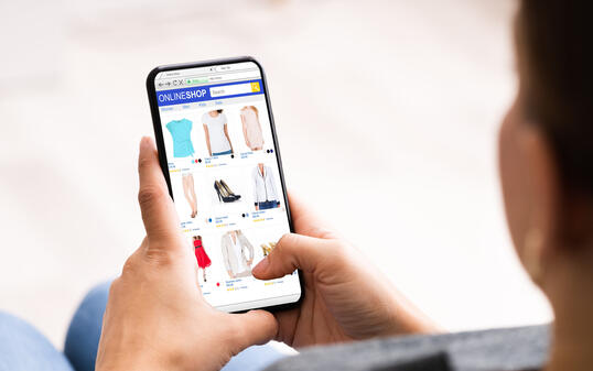 Hand Holding Online Ecommerce Store Open